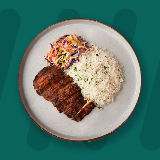 Jerk Chicken, Coconut Rice, Mango , Lime and Coriander Slaw