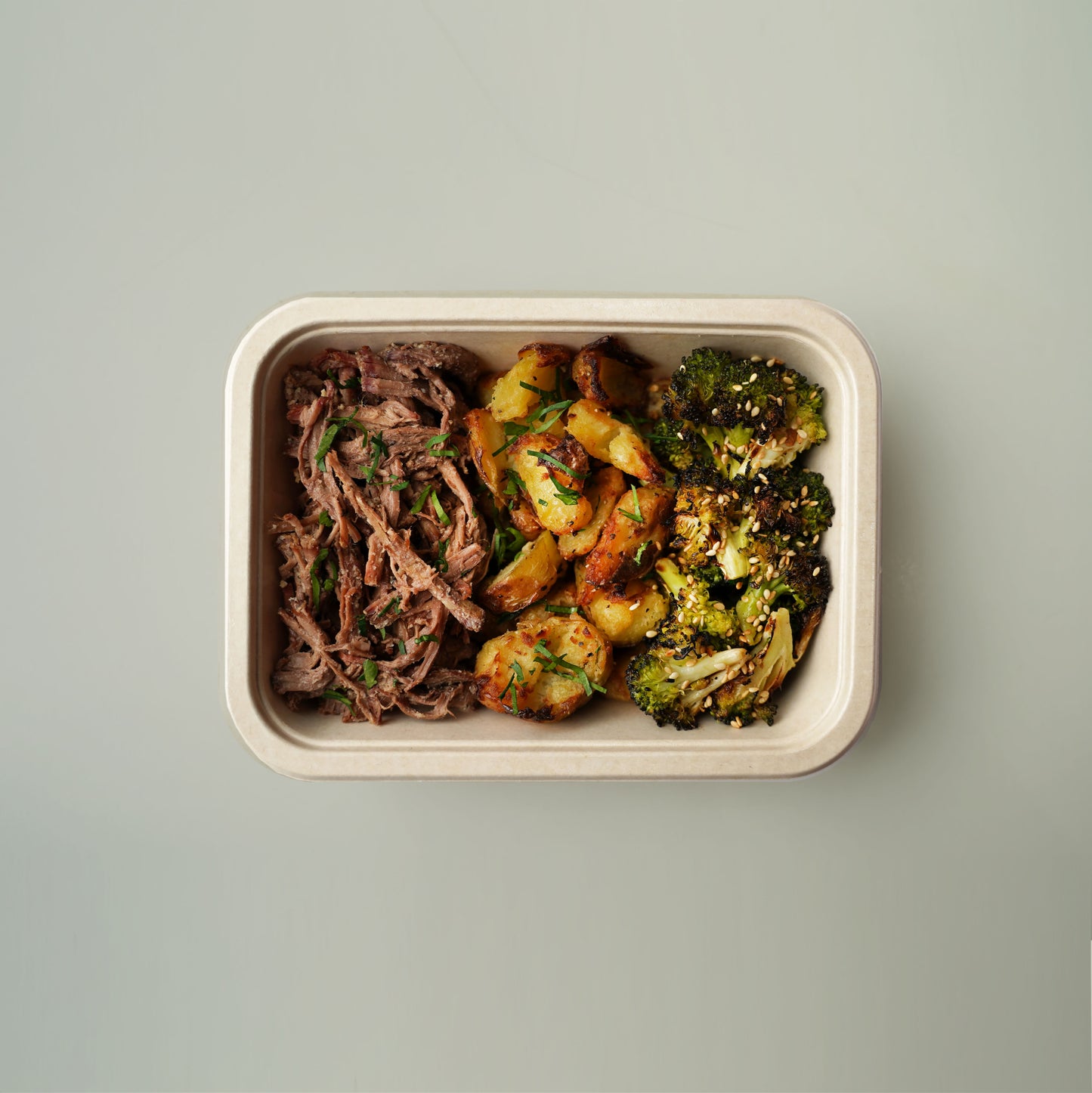 Smoked Pulled Beef, Garlic & Herb Crushed New Potato, Charred Broccoli with Sesame Seeds