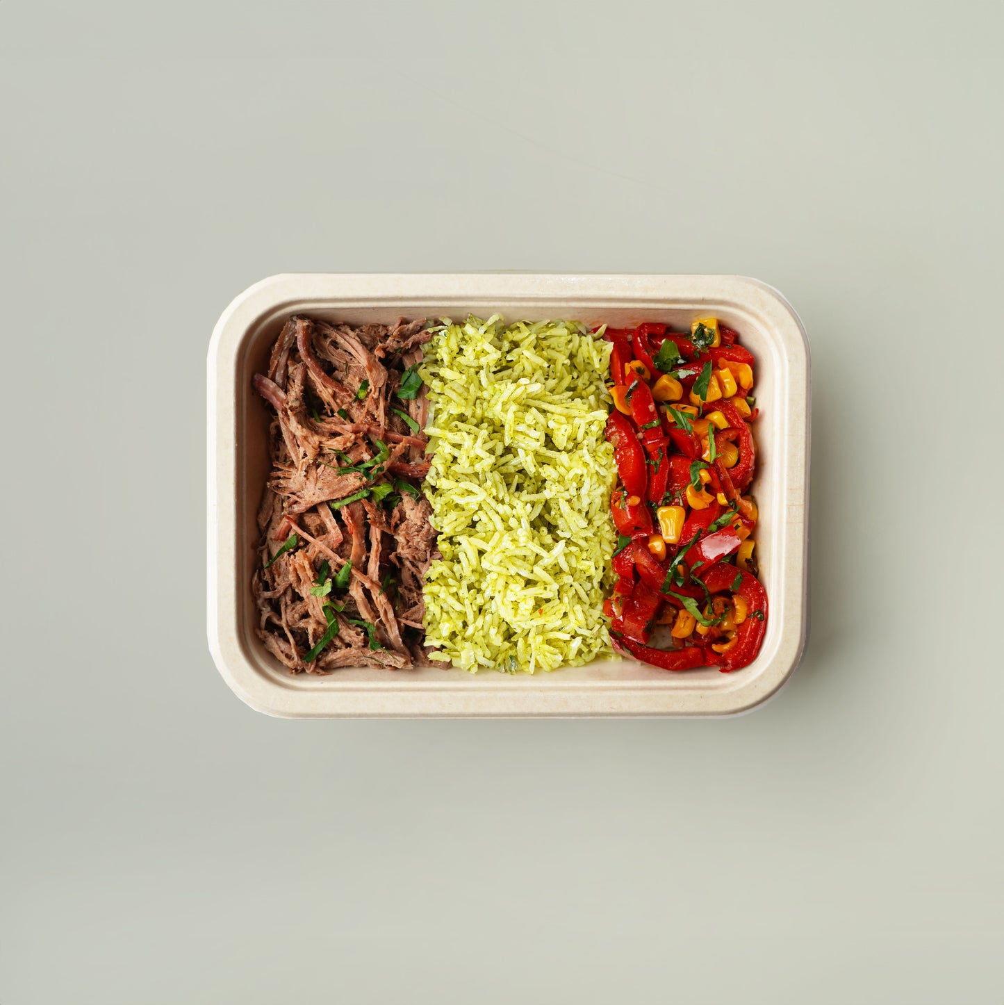 Smoked Pulled Beef, Coriander Rice, Sautéed Peppers with Corn & Lime