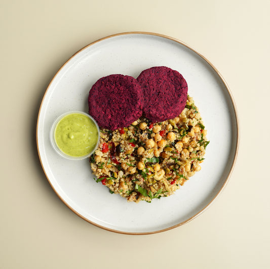 Beetroot, Black Bean, and Haloumi Fritters, Quinoa, Chickpea, Grilled Aubergine, Red Pepper, Sundried Tomato, and Olive Salad. Avocado and Lime Dressing