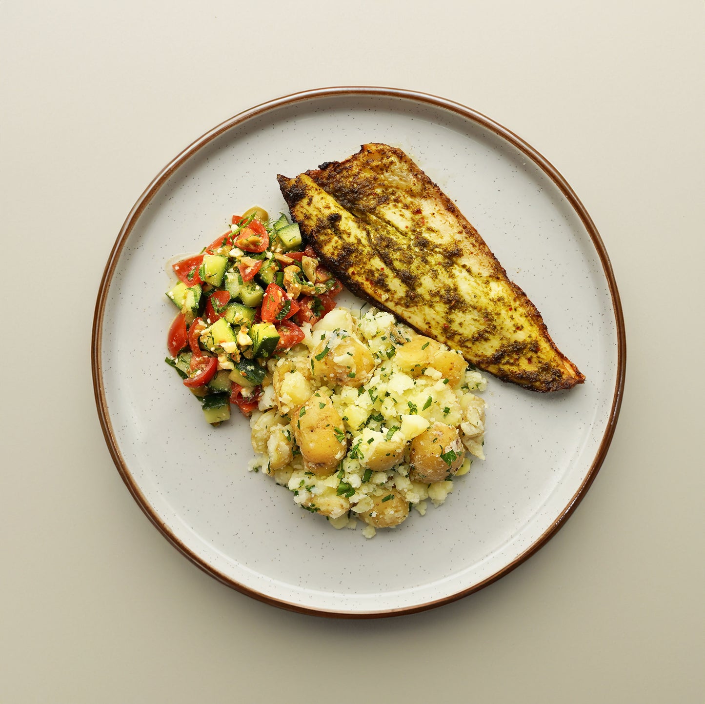 Lemon and Herb Sea Bass, Chive and Garlic Crushed Potato, Olive and Feta Salad