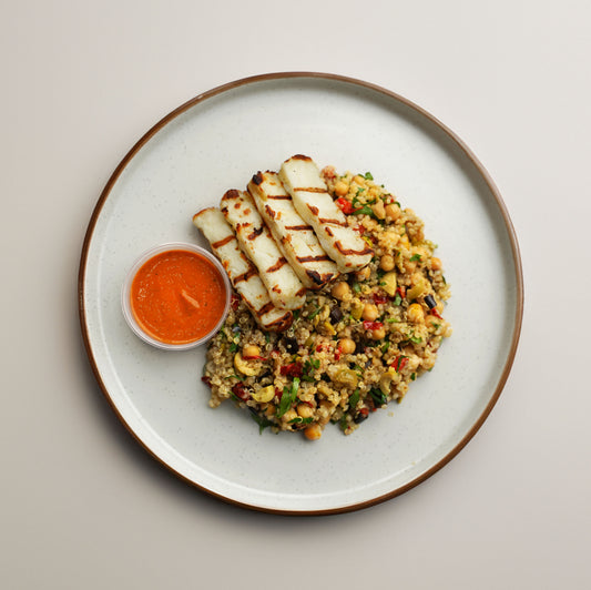 Grilled Haloumi, Quinoa, Chickpea, Grilled Aubergine, Red Pepper, Sundried Tomato, and Olive Salad. Orange and Harissa Dressing